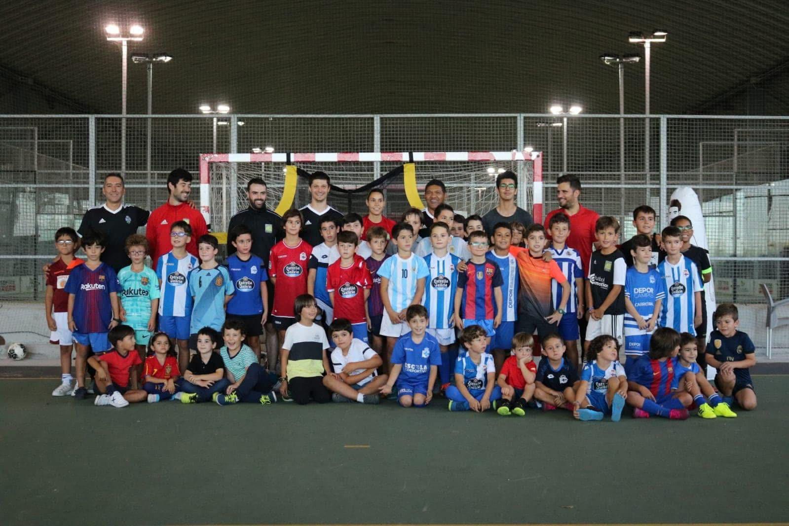 Donato Gama da Silva con entrenadores y participantes del Campus